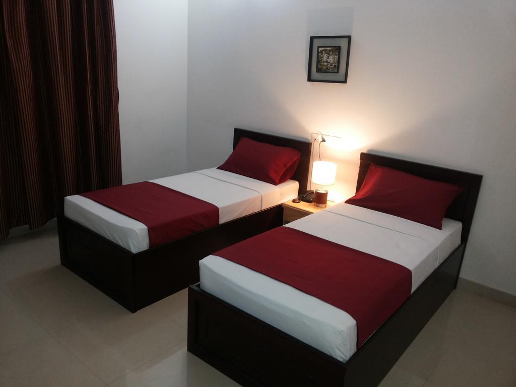 Azaiba Hotel Apartments Maszkat Szoba fotó