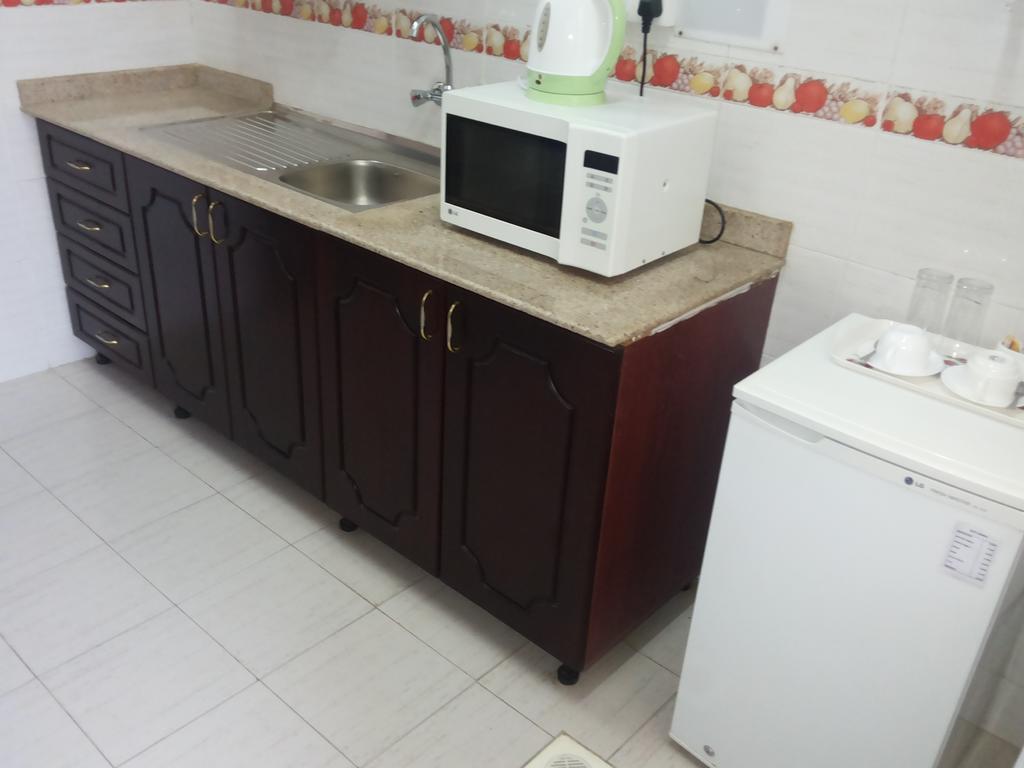 Azaiba Hotel Apartments Maszkat Szoba fotó